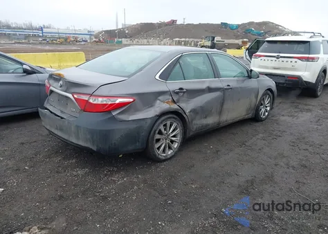 2016 Toyota Camry Hybrid Le z USA, uszkodzony, nr VIN 4T1BD1FK1GU183791